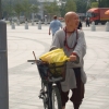 07 - Monk with a bike in Hong Kong